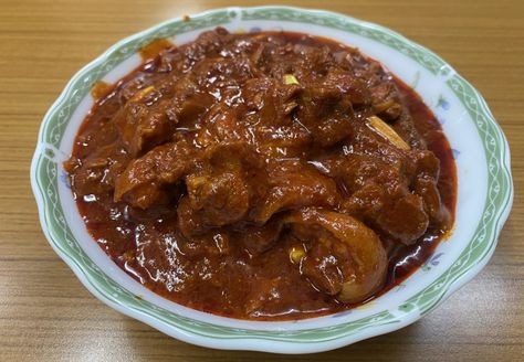 Pork Vindaloo Pork Vindaloo Recipe, Pork Vindaloo, Vindaloo Recipe, Vindaloo, Marinated Pork, The Sisters, Red Chilli, Cinnamon Sticks, Ingredients Recipes