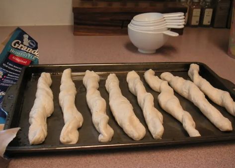 How to Make Breadsticks From Canned Biscuits - Delishably Can Biscuit Recipes Dinner, Breadsticks From Biscuit Dough, Bread Sticks From Canned Biscuits, Uses For Canned Biscuits, Garlic Bread From Canned Biscuits, Canned Buiscits Recipes, Can Biscuit Recipes, Pillsbury Breadsticks, Can Biscuits Ideas