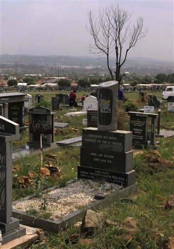 In this photo taken Thursday, Dec 8. 2011, a headstone marks the grave in the Mamelodi townhip, Pretoria, of the late Solomon Mahlangu, an anti-apartheid guerilla who was hanged on April 6, 1979. The government opened the gallows as a monument at Pretoria, South Africa, Thursday, Dec. 15, to those who were executed before being stopped in 1989 and abolished in 1995. (AP Photo/Denis Farrell) Solomon Mahlangu, Government Aesthetic, Pretoria South Africa, South Africa Travel, April 6, Pretoria, Dec 8, Tombstone, Technology News