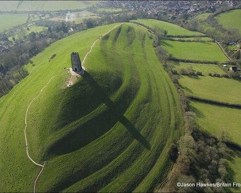 Location: Somerset, England.  Glastonbury Tor: (Avalon, The "Sacred Heart" of England)  Grid Reference: 51° 09' N, 2° 45' W. Glastonbury England, Glastonbury Tor, Roi Arthur, Places In England, Aerial Photograph, San Michele, England And Scotland, Sacred Places, Stonehenge