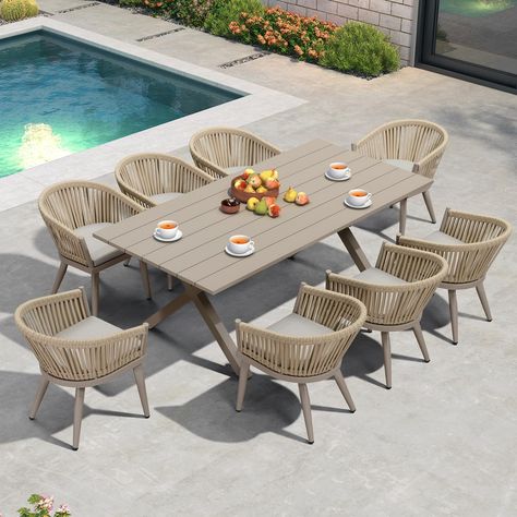 PRICES MAY VARY. The all-weather dining table set includes: 1 X dining table (80.71"L x 38.58"W x 29.13"H), 8 X dining chairs (19.69"L x 18.5"W x 29.33"H), and 8 X cushions. Premium Material: All Aluminum frames with powder coating impart exceptional structural robustness, ensuring long-term integrity and rust resistance. Ergonomic Design: The backrest angle of dining chairs is optimized for superior ergonomic support and comfort. Soft Cushion: High-density fabric and sponge create a soft, durab Porch Landscaping, Small Outdoor Patios, Modern Outdoor Dining, Wicker Dining Set, Outdoor Patio Table, Outdoor Table Settings, Patio Dining Table, Front Porch Decorating, Dining Table Set