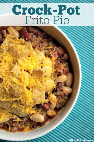 Crock-Pot Frito Pie - Some folks call this dish "walking tacos" but we simply call it Crock-Pot Frito Pie. Crunchy Frito corn chips are topped with an easy homemade chili. YUM! [Low Fat, High Fiber, Low Sugar and just 8 Weight Watchers SmartPoints per serving] #CrockPotLadies #CrockPot #SlowCooker #WeightWatchers #Dinner Easy Homemade Chili, Amazing Slow Cooker Recipes, Frito Pie, Walking Tacos, Homemade Chili, Easy Slow Cooker Recipes, Corn Chips, Crock Pot Soup, Crock Pot Slow Cooker