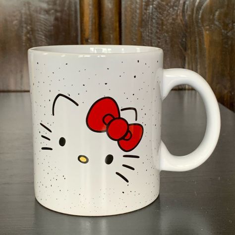 This Is A Beautiful 20oz Ceramic Mug From The Sanrio Hello Kitty Collection. Gorgeous White Color With Black Speckle Pattern And Adorable Double Sided Design Featuring A Hello Kitty Face With Red Bow. Brand New And In Excellent Condition. Comes From A Smoke Free Home. Hello Kitty Cup Designs, Hello Kitty Dishes, Hello Kitty Mug Design, Sanrio Mug, Hello Kitty Mug Aesthetic, Pink Hello Kitty, Cute Doodles Drawings, Cute Bedroom Decor, Hello Kitty Collection