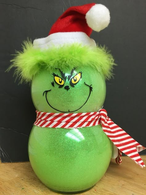 29 INSANELY CUTE & EASY DIY GRINCH CENTERPIECE IDEAS - Stylin by Sarita Grinch Centerpiece, Snowglobe Ideas, Grinchmas Decorations, Fish Bowl Crafts, Decoration With Lights, Diy Grinch, Grinch Crafts, Glitter Globes, Red Santa Hat