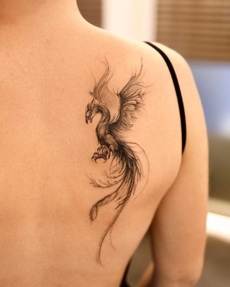 Phoenix Tattoo Design Ideas. Artist:@tattooist_baekyeon #PhoenixTattoo #TattooDesign #GirlsWithInk Phoenix Tattoo Women, Purple Ribbon Tattoos, Phoenix Tattoo Sleeve, Phoenix Back Tattoo, Wing Tattoo Men, Phoenix Tattoo Feminine, Small Phoenix Tattoos, Phönix Tattoo, Brush Tattoo