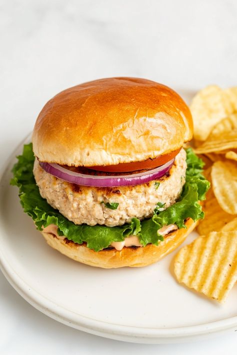 Delight your taste buds with these flavorful ground chicken burgers that are juicy and packed with deliciousness! Whether you're grilling up a storm or looking for a quick and easy meal idea, these burgers are the perfect choice. Elevate your burger game with this simple yet satisfying recipe that will surely become a family favorite. Enjoy them on their own or stack them high with all your favorite toppings for a mouthwatering experience. Ground Chicken Burger Recipes, Chicken Burgers Ground, Chicken Burger Recipe, Ground Chicken Burgers, Chicken Burgers Recipe, Comfort Casseroles, Ground Chicken Recipes, Asian Inspired Dishes, Chicken Burger