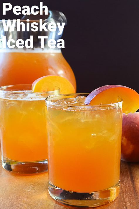 A glass of peach whiskey iced tea with a pitcher of peach whiskey iced tea in the background. Peach Whiskey Iced Tea, Sweet Tea Whiskey Cocktail, Spiked Tea Recipe, Tea Alcohol Drinks, Peach Old Fashioned Cocktail, Crown Peach Drinks Recipes Cocktails, Iced Tea Alcohol Drinks, Peach Whiskey Cocktails, Peach Whiskey Drink