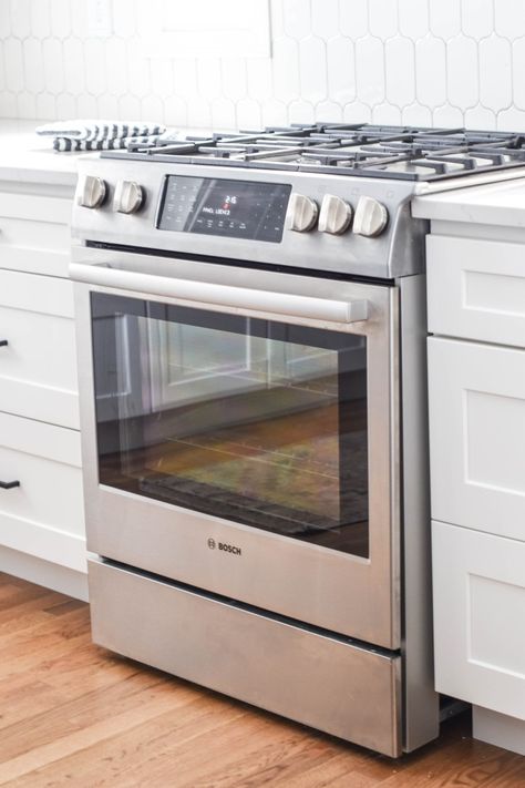 bosch dual fuel range - gas top european induction oven in a white kitchen Farmhouse Neutral Paint Colors, Bosch Kitchen Appliances, Double Oven Electric Range White, Cambria Ella, Best Gas Ovens 2021, Kitchen Aide Double Electric Oven, Bosch Appliances Kitchen, Cambria Quartz Kitchen Countertops, Electric 36in Double Oven