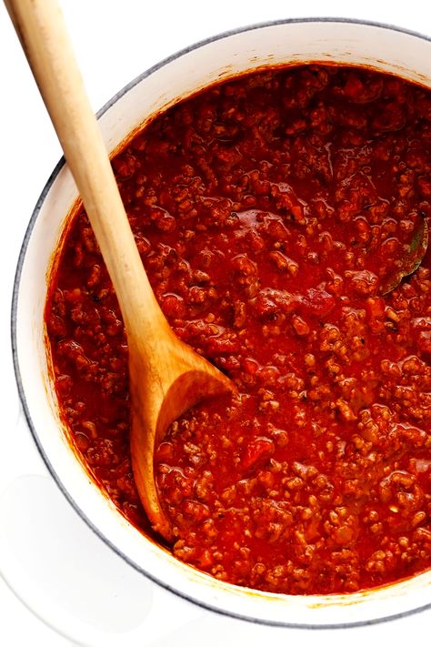 This amazing Bolognese sauce recipe is slow-simmered with a rich tomato base, a delicious blend of beef and pork, and the coziest blend of garlicky herb seasonings.  Serve with pasta, gnocchi, or roasted eggplant and enjoy! | gimmesomeoven.com #bolognese #italian #meat #sauce #marinara #pasta #spaghetti #dinner #beef Sauce For Gnocchi, Best Bolognese Sauce, Beef Bolognese, Homemade Bolognese Sauce, Spaghetti Recipes Easy, Bolognese Sauce Recipe, Ground Beef Recipe, Italian Meats, Bolognese Recipe