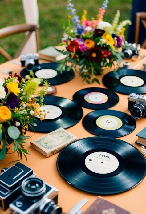 I love using vinyl records as unique decor for vintage eclectic weddings. Old records make great table centerpieces when propped up in stands. I sometimes pair them with vintage record players as fun focal points. Vinyl Record Wedding Centerpieces, Vinyl Wedding Decor, Vinyl Centerpieces Wedding, Record Centerpieces Ideas, Vintage Eclectic Wedding, Eclectic Wedding Decor, Vintage Record Players, Vinyl Record Display, Vintage Record Player