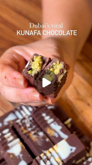 Thecrazyindianfoodie® - Mumbai on Instagram: "Dubai’s viral kunafa chocolate recipe! Save now!   You don’t need to spend thousands of rupees or travel all the way to Dubai to have these viral kunafa pistachio chocolates!   You can make them at home with this simple recipe. It tastes so good!😍   All you need is (for 3 bars or 1 bar and 12-13 pieces of chocolate) :   - 200 gms dark chocolate (use any like regular or compound, I prefer @amulindia chocolates).  - 200 gms milk chocolate (you can also use either one in 2x).  - 50 gms white chocolate (optional). - Edible glitter (optional).  - 150 gms unsalted, plain pistachios.  - 3-4 tsp condensed milk.  - 1 tsp butter.  - 1/2 cup seiveiyan (vermicelli) or kunafa.   How to melt chocolate? To melt the chocolate, roughly chop room temp chocolate Dubai Viral Kunafa Chocolate Recipe, Pistachio Kunafa Chocolate Bar, Dubai Viral Chocolate, Dubai Kunafa Chocolate, Kunafa Chocolate Recipe, Home Made Chocolate Recipe Easy, Chocolate Kunafa Recipe, Viral Dubai Chocolate Bar Recipe, Dubai Chocolate Recipe