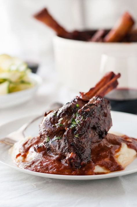 Slow Cooked Lamb Shanks in Red Wine Sauce - a classic recipe, meltingly tender meat and a rich red wine based gravy. Easy to make! Sue Blackwell, Lamb Shanks Slow Cooker, Slow Cooked Lamb Shanks, Lamb Shank Recipe, Braised Lamb Shanks, Slow Cooker Lamb, Lamb Shank, Tender Meat, Braised Lamb