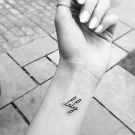 Small wrist tattoo. Lily Name Lily Tattoo, Lily Tattoo Name, Lilly Name Tattoo, Lily Name Aesthetic, Lily Name Tattoo, Small Name Tattoos On Wrist, Chloe Tattoo, Lily Name, Small Name Tattoo