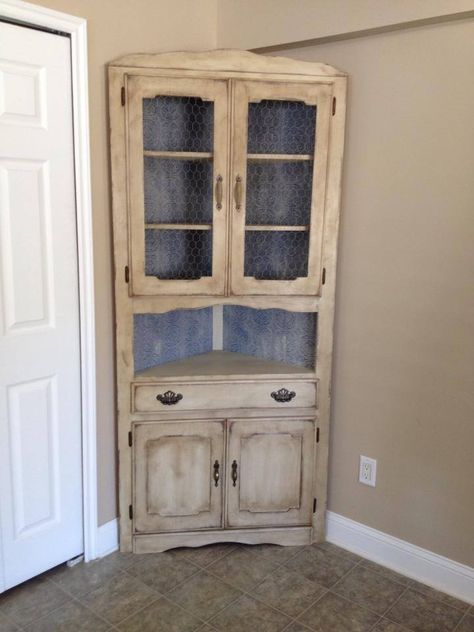 Corner hutch with paintable wallpaper and chicken wire. Farmhouse Corner Hutch Living Room, Kitchen Esthetics, White Corner Hutch, Black Corner Hutch, Antique Corner Hutch, Bookcases Ideas, Pine Hutch, Reclaimed Corner Cabinet, Corner Cabinet China Cabinets & Hutches