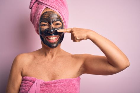 Lavender/pink wall with a woman smiling wearing a bath towel around her body and her hair pulled up into another towel pointing to her note with a charcoal face mask. Contour Tricks, Best Beauty Products, Facial Sunscreen, Anti Aging Ingredients, Gel Moisturizer, Anti Aging Serum, Spf Sunscreen, Simple Beauty, Aging Skin Care