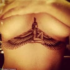 Rihanna sternum tattoo Rihanna Tattoo Chest, Tattoo Rihanna, Tattoos For Women On Thigh, Rihanna Tattoo, Henne Tattoo, Rihanna Show, Rihanna News, Underboob Tattoo, Goddess Tattoo