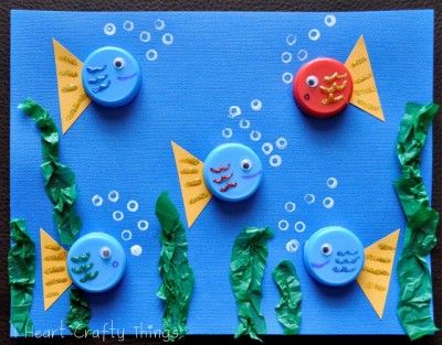 bottlecap crafts | Bottle Cap Fish | Fun Family CraftsFun Family Crafts #bottlecapcrafts #teachercrafts Water Bottle Crafts, September Crafts, Bottle Cap Art, Fish Crafts, Bottle Cap Crafts, Ocean Crafts, Animal Crafts For Kids, Kindergarten Science, Family Crafts