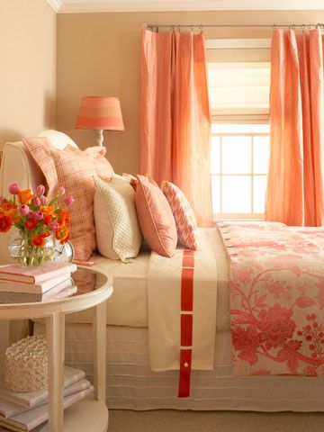 Salmon + Rose

    The warm color palette in this enchanting bedroom begins with the walls. Paint in a deep, dusty taupe with whispers of rose creates a feeling of intimacy, while salmon-color silk taffeta draperies define the window and add sheen. A floral duvet on the bed blushes in shades of pink that are echoed in the painted lampshade. Coral Bedroom, Orange Decor, Guest Bedrooms, Spring Home, Beautiful Bedrooms, Dream Bedroom, My New Room, New Room, Guest Bedroom