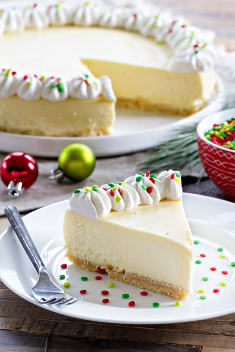 Sugar Cookie Cheesecake is sweet, creamy and deliciously festive for the holidays! A must-make! Baileys Truffles, Sugar Cookie Cheesecake, Holiday Cheesecake, Cookie Cheesecake, Chocolate Baileys, Christmas Cheesecake, Sugar Cookie Crust, Cheesecake Cookies, Dessert Ideas