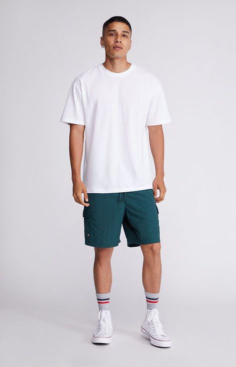 Keep things cool and casual with help from the Reece Regular T-Shirt. This new PacSun go-to has an easy regular fit, a soft cotton construction, and a versatile solid color design.


	Solid color tee
	Crew neck
	Short sleeves
	Regular fit
	100% cotton
	Machine washable
	Model is wearing size medium Plain Tshirt Template, Baby Surf, Pose Style, Blank T Shirts, Clothing Mockup, Cinematic Photography, Plain Tshirt, Shirt Mockup, Free Mockup