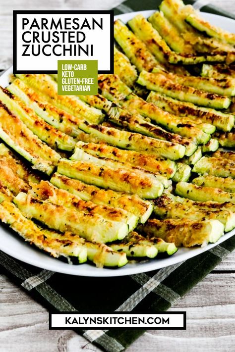 "Pinterest Image for Parmesan Crusted Zucchini showing zucchini on white plate on a black napkin." Cooking Zucchini, Low Carb Zucchini Recipes, Parmesan Crusted Zucchini, Dessert Restaurant, Cauliflower Pizza Crust Recipe, Tuna Casserole, Appetizers For A Crowd, Low Carb Zucchini, Parmesan Crusted