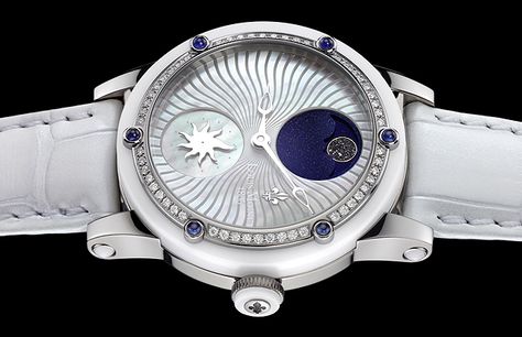 Stardance, the magic of the stars  The Louis Moinet Stardance is a ladies’ watch inspired by the interstellar world. Its mother-of-pearl dial presents the two universes of the day and night. The night is evoked by the splendid moon phase, in which the moon is adorned with a fine slice of Enstatite EH3 meteorite, containing interstellar diamonds. The cosmos is depicted in aventurine, creating a decidedly sidereal overall effect. Alternating with the nocturnal world is that of daytime.. Louis Moinet Watch Women, Villas Luxury, Louis Moinet, First Watch, Ski Chalets, Expensive Watches, Wrist Wear, Daily Jewelry, Watch Women