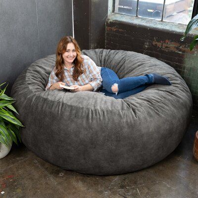 Saddle up for oversized snuggles and wrangle in a plush piece of statement furniture with the Saxx 6’ Faux Hide Bean Bag. Boasting a massive form ideal for lazy weekend family bonding or the ultimate in relaxation for one, the Saxx 6’ Faux Hide Bean Bag brings body-hugging comfort to casual living spaces. Covered in ultra-soft micro velvet with a leather-like textured appearance, the Saxx 6’ Faux Hide Bean Bag perfectly pairs Western charm with a smooth tactile experience. Fabric: Pewter Microfi Beanbag Couch, Huge Bean Bag, Large Bean Bag Chair, Bean Bag Pillow, Giant Bean Bag Chair, Bean Bag Bed, Bean Bag Lounger, Adult Bean Bag Chair, Large Bean Bags