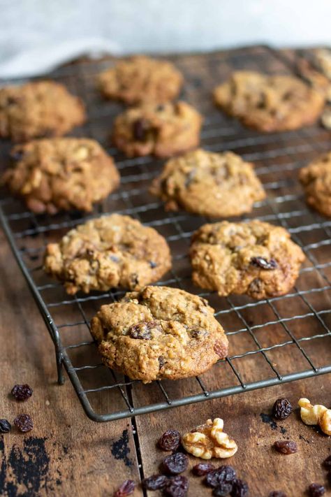 If you love Mrs. Fields Oatmeal Raisin Cookies, then you're going to love this copycat recipe that tastes just like the real thing! These cookies are soft and chewy, with a delicious oatmeal, raisin, and walnut flavor. They're perfect for dessert or a snack! If you're ever walking through a mall and the smell of... Read More Mrs. Fields Oatmeal Raisin Cookies (copycat) © You Say Potatoes. Costco Copycat Oatmeal Raisin Cookie Recipe, Copycat Costco Oatmeal Raisin Cookies, Oatmeal Raisin Walnut Cookies Recipes, Giant Oatmeal Raisin Cookies, Mrs Fields Oatmeal Raisin Cookies, Oatmeal Raisin Cookies With Molasses, Oatmeal Golden Raisin Cookies, Mrs Fields Cookie Recipe, Oatmeal Raisin Walnut Cookies