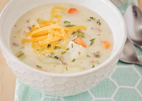 Crock Pot cheeseburger soup is full of the same savory flavors of a juicy cheeseburger but in a delicious soup. This recipe can be made using either a crock pot or an instant pot so it's the perfect make-ahead dinner for a busy night! #cheeseburgersoup #crockpotcheeseburgersoup #instantpotcheeseburgersoup #cheeseburgersouprecipe #easycheeseburgersouprecipe Navy Bean Recipes, Navy Bean Soup, Bean And Bacon Soup, Cheeseburger Soup, Navy Bean, Baked Potato Soup, Soup Crocks, Super Easy Recipes, Rice Soup