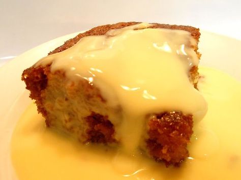 Malva pudding Malva pudding is a sweet pudding of Cape Dutch origin. It contains apricot jam and has a spongy caramelized texture. A cream sauce is often poured over it while it is hot, and it is usually served hot with custard and/or ice-cream. Malva Pudding Recipe, South Africa Food, Malva Pudding, African Dessert, Winter Dessert Recipes, Africa Food, Custard Recipes, Winter Desserts, Africa Do Sul