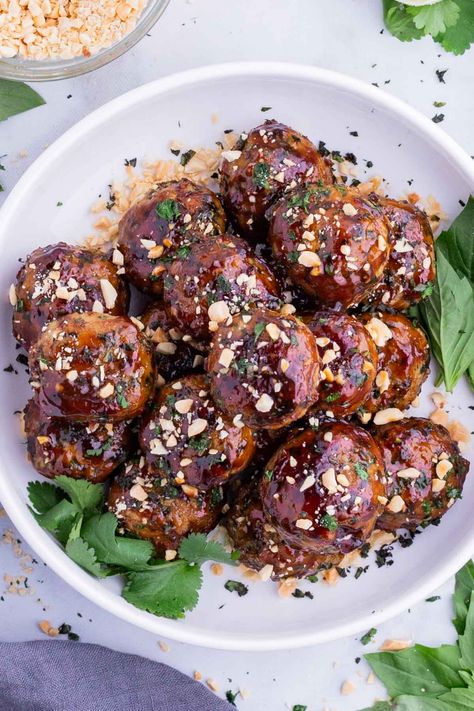 Sticky Thai Chicken Meatballs Recipe - Evolving Table Thai Chicken Meatballs, Thai Meatballs, Air Fryer Brussels Sprouts, Chicken Meatballs Recipe, Sweet Teriyaki Sauce, Peanut Salad, Chili Garlic Paste, Easy Quinoa, Chicken Meatball Recipes