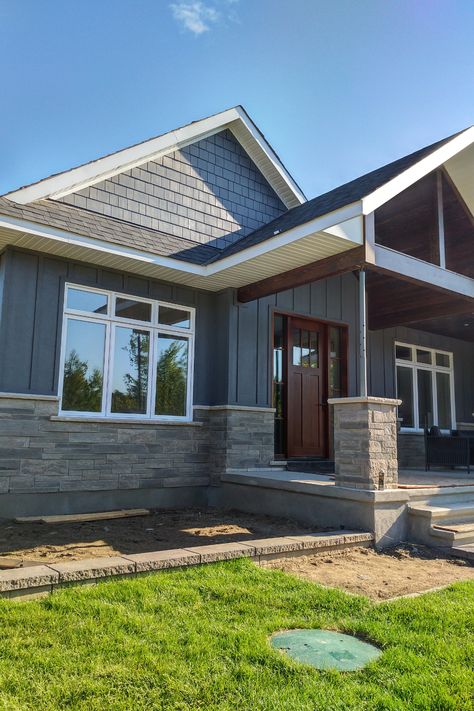 Baton Board Exterior, Shaker And Board And Batten Exterior, Board And Batten Siding Gray, Hardie Board Siding Ranch House, Hardy Board Siding With Brick, James Hardie Exterior, James Hardie Night Gray Siding, Grey Ranch House Exterior, Board And Batten With Stone Exterior