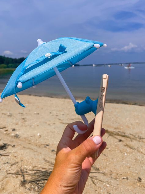 Amazon find. Amazon must have beach accessory. Phone umbrella. Accessories. Beach day. Beach. Vacation. Vacation essentials. iPhone. Phone accessories. Amazon must haves. Amazon gadgets. Random fines. Beach Gadgets Accessories, Fix Flip Flops, Umbrella Accessories, Phone Umbrella, Beach Gadgets, Beach Breakfast, Accessories Beach, Vacation Essentials, Amazon Must Haves