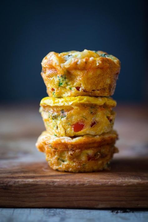 These Grab and Go Veggie Egg Cups are my fave for a healthy high-protein breakfast for busy mornings. They’re made with any variety of low-carb veggie you like, plus fresh eggs, cheddar cheese and seasoning. Each serving has 17 grams of protein! They are sugar-free, grain-free, vegetarian and low-carb too. DISCLOSURE: This post is sponsored … Veggie Egg Cups, Breakfast For Busy Mornings, Egg Cups Recipe, Healthy High Protein Breakfast, Egg Dishes, High Protein Breakfast, Egg Bites, Mini Pizza, Breakfast Muffins