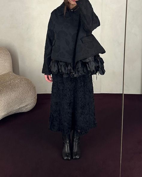 From Comme Des Garçons, the black jacquard taffeta jacket with floral detailing and ruffled layers. Worn here with the shaggy sheer tank dress from Song for the Mute and the Maison Margiela leather tabi boots. ⁠ ⁠ Black Tabi Boots Outfit, Maison Margiela Tabi Outfit, Commes Des Garcons, Taffeta Jacket, Tabi Boots, Style Moodboard, Boots Outfit, Comme Des Garcons, Tank Dress