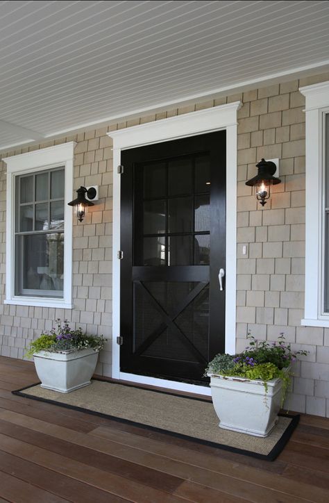 Pretty front entry.  I like the long welcome mat that has the planters sitting on it as well. Door Beige, Entrance Hallways, Black Front Door, Coastal Exterior, Black Front Doors, Black Door, Main Door, Black Doors, Front Entry