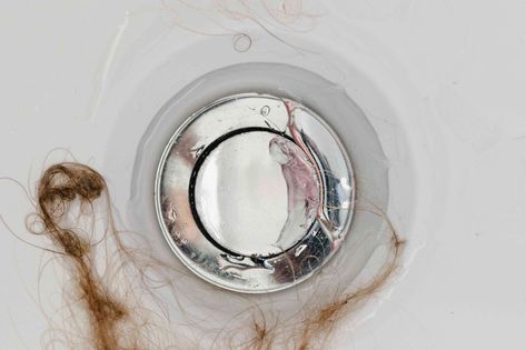 Hair in a bathtub, shower, or sink drain will combine with soap scum to form a clog that slows or stops drainage. Learn three ways to get hair out of a bathtub drain. How To Get Hair Out Of Shower Drain, How To Declog A Tub Drain, Unclog Tub Drain Bathtub, How To Unstop A Bathtub Drain, Unclog Bathtub Drain, Hair Buildup, Hair Remover Tool, Drain Opener, Women Health Care