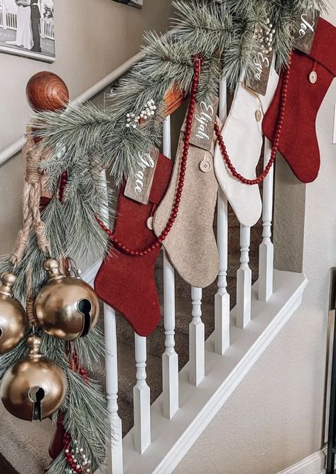 No Fireplace? No problem. Try These 20 Creative Christmas Stocking Hanging Ideas — ASHLINA KAPOSTA Stockings On The Stairs, Christmas Stocking Tree, Stockings On Stairs With Garland, Stockings Hung On Stairs, Christmas Stockings No Fireplace, Christmas Decor Ideas For Staircase, Christmas Stocking Hanging Ideas, Stockings On Staircase, Stocking Hanging Ideas