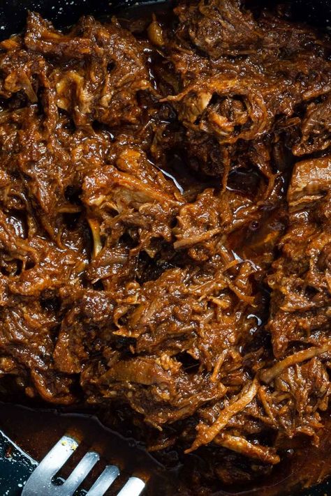 The Best Beef Barbacoa Recipe Ever (Crockpot) - RecipeMagik Barbacoa Dutch Oven Recipe, Cheek Meat Barbacoa Crockpot, Barbacoa Sauce Recipe, Easy Barbacoa Crock Pot, Beef Cheeks Recipe Barbacoa, Spanish Beef Recipes, Authentic Mexican Barbacoa Recipe, Chuck Roast Crock Pot Recipes Mexican, Barbacoa Crock Pot Mexican Authentic