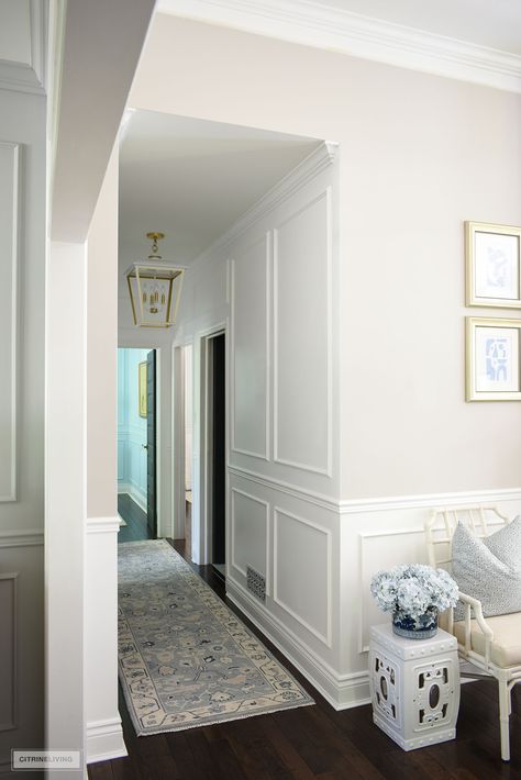 Hallway Moulding Wainscoting, Wall Molding Lighting, Molding Halfway Up Wall, Picture Molding In Hallway, Small Entryway Paneling, Framing Hallway Entrance, Wall Trim Hallway, Hallway With Wainscotting, Entry Molding Ideas