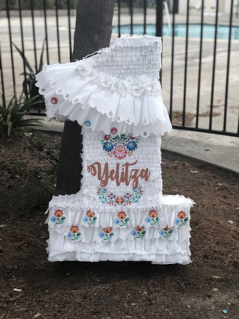 Fiesta themed Baptism Pinata, all white with mexican themed flowers added. All White Mexican Theme Party, Hacienda Baptism, Mexican Theme Baptism For Girl, Baptism Mexican Theme, Baptism Pinata, Mexican Baptism Ideas, Mexican Pinata, Baptism Decorations Girl, Mexican Themed Weddings