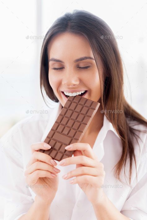 Eating Chocolate Photography Woman, Woman Eating Chocolate, Eating Chocolate, Woman In White, Smiling Woman, Banner Background Images, Person Sitting, Banner Background, Eyes Closed