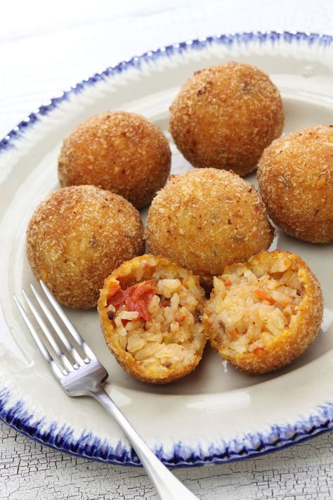 This Giada de Laurentiis arancini di riso recipe or you may want to call it fried and stuffed rice balls is a good reason to make an extra batch of her basic Joanna Gaines Arancini Recipe, Arancini Balls Recipes, Stuffed Rice Balls, Arancini Balls, Green Salad Dressing, Arancini Recipe, Giada Recipes, Mozzarella Cheese Sticks, Carrot Fries