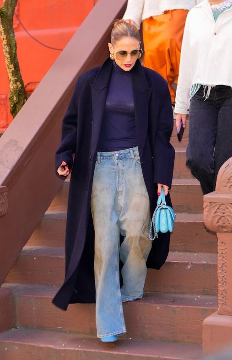 Jennifer Lopez Sends a Message in a Crop Top and $6,300 Dior Basket Bag | Marie Claire Amina Muaddi Outfit, All Blue Outfit, Best White Shirt, Jennifer Lopez Outfits, Celebrity Look Alike, Slogan Tee, Amina Muaddi, Denim Trends, Bag Shop