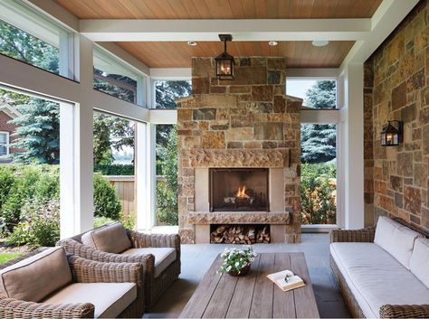 A cozy screen porch with a fireplace offers glimpses of Lake of the Isles. Screened Porch Designs, 3 Season Room, Porch Fireplace, Three Season Room, Building A Porch, Sunroom Designs, Casa Country, Mill Valley, House With Porch