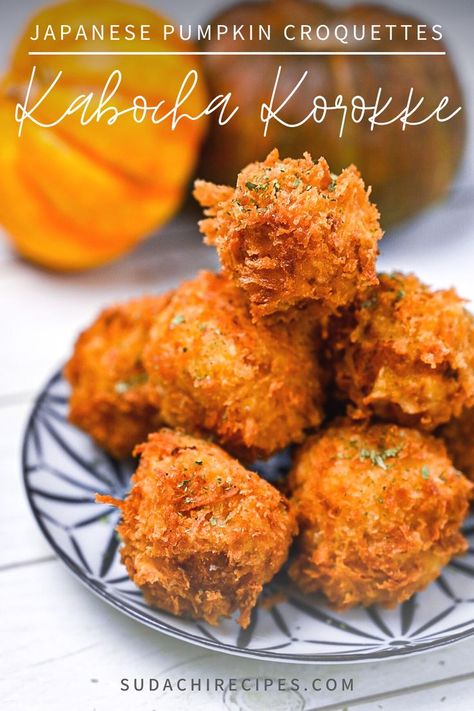 A stack of deep fried kabocha korokke, Japanese pumpkin croquettes sprinkled with dry parsley Pumpkin Croquettes, Sudachi Recipes, Japanese Pumpkin, Japanese Appetizers, Comforting Meals, Cheese Dinner, Autumn Recipes, Japanese Cooking, Fried Vegetables