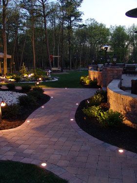 Evening Star Lighting | Paver Lights - Deck Lights - Dock Lights - Wall Lights. Backyard Wall Lights, Paver Patio Lighting Ideas, Lights In Patio Floor, Lighted Sidewalk Ideas, Patio Ground Lighting, Paver Lights Walkways, Front Walkway Lighting Ideas, Pool Landscape Lighting, Pavers Lighting