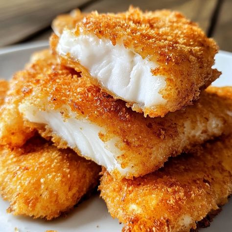 🐟🍴 Discover the perfect crunch with our Extra Crunchy Fish Fillet—a crispy, satisfying dish that’s a hit with everyone! 🐟🌟 #CrunchyFish #SeafoodDelight Extra Crunchy Fish Fillet Ingredients: Fish fillets (4, any white fish) Flour (1 cup) Cornstarch (1/2 cup) Baking powder (1 tsp) Salt (1/2 tsp) Pepper (1/2 tsp) Eggs (2) Cold water (1 cup) Oil (for frying) Instructions: Mix flour, cornstarch, baking powder, salt, and pepper. Dip fish in flour mixture. Beat eggs and mix with cold water. Dip... Crunchy Fried Fish, Fried Fish And Spaghetti, Southern Fried Fish, Fish Goujons, Crunchy Fish, Fish Fried, Pepper Dip, Burger And Chips, Seafood Dish Recipes