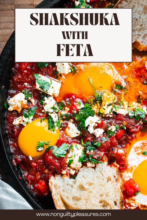 This Shakshuka with feta recipe is a quick and easy one-skillet meal that's perfect for breakfast, brunch, or even dinner! This vegetarian dish features eggs poached in a spiced tomato sauce with sprinkled with creamy feta cheese. This dish is a popular North African and Middle Eastern breakfast dish that's now enjoyed all over the world. The addition of feta is inspired by the New York Times (NYT) recipe by Melissa Clark. It adds a delicious twist to this traditional dish. African Breakfast Recipes, Shakshuka Harissa, Eggs Feta Cheese Breakfast Recipes, Melissa Clark Recipes, Shakshuka Recipe With Meat, Shakshuka With Meat, Shakshuka With Feta, Middle Eastern Breakfast, Easy Shakshuka