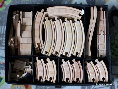 Organizing Wooden Trains and Track: how we store our trains on the rare occasions when we're not playing with them @ Play Trains! Toy Trains Storage, Toy Clutter, Wooden Train Track, Wood Train, Toy Storage Solutions, Train Miniature, Wooden Train Set, Hanging Closet Organizer, Lego Toy